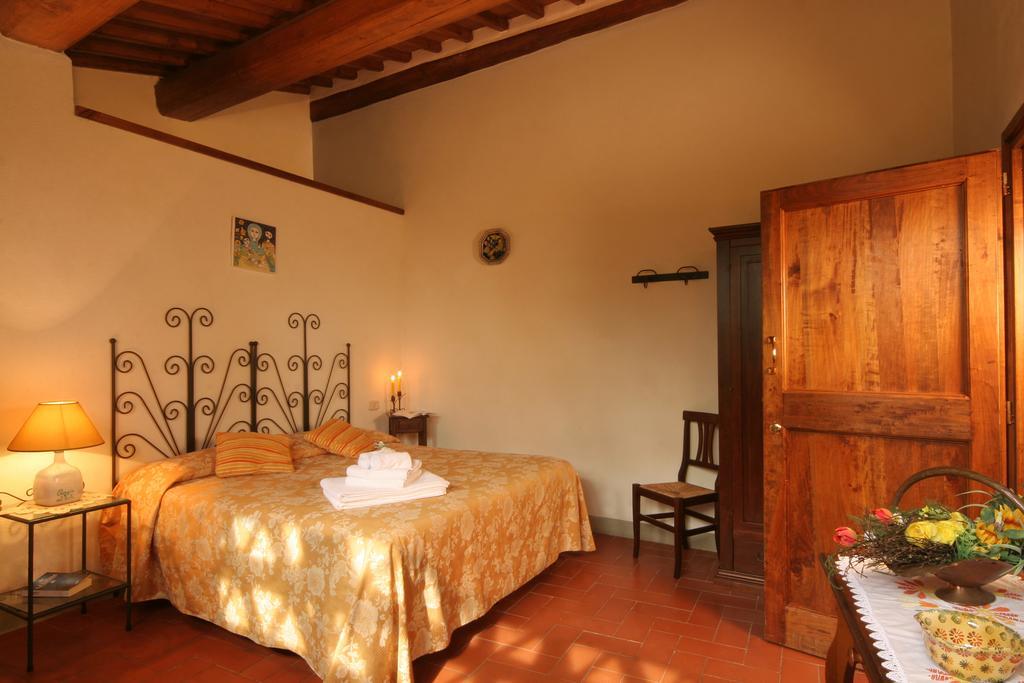 فندق فيسوليفي  Agriturismo Poggio Al Sole الغرفة الصورة